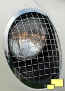 1953 Corvette EX-122 headlight with stone guard covering