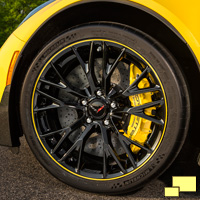 2015 Chevrolet Corvette Z06 C7.R Special Edition black wheels with yellow accent strip and Corvette Racing-logo center caps