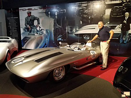 Peter Brock, who worked on the design of the 1959 Sting Ray Racer, poses with it at the National Corvette Museum in 2017